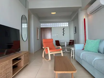 a living room with a couch and chairs and a table at Breathtaking Sea and Marina View City Center 2 bdr in Larnaka