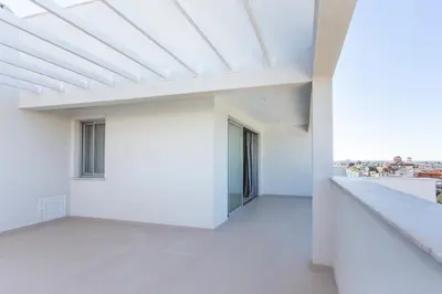 an empty white building with a skylight at BlueStar Limassol Suites in Limassol