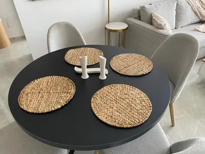 a black table with two plates on top of it at Sunrise 80 in Aglantzia
