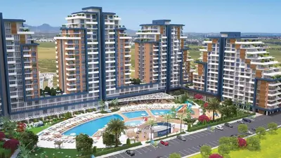 an aerial view of an apartment complex with a swimming pool at Sunrise 80 in Aglantzia