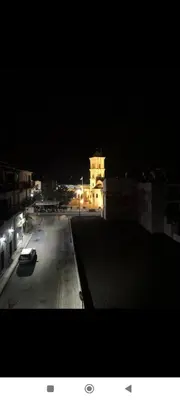 a view of a city at night with a building at 103 St Lazaros View Studio in Larnaka