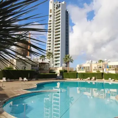 Cozy flat by the sea with big pool tourist area