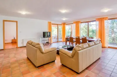 a large living room with two couches and a table at STAY Hillcrest Panorama Villa in Moniatis