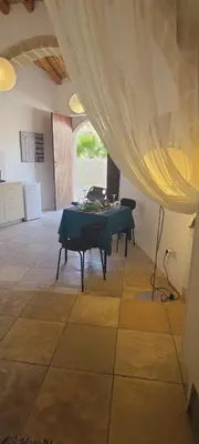 a room with a table with a table cloth on it at Cottage Studio Zoe in Psematismenos