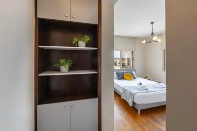 a bedroom with a bed in a room at Mackenzie Beachfront Eftyhia Suite in Larnaka