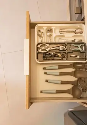 a drawer filled with utensils in a kitchen at K-Apartments Managed by Quattro Forze Group in Larnaka