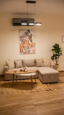 a living room with a couch and a coffee table at K-Apartments Managed by Quattro Forze Group in Larnaka