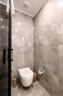 a bathroom with a toilet and a shower at Panorama Comfort Suita in Protaras