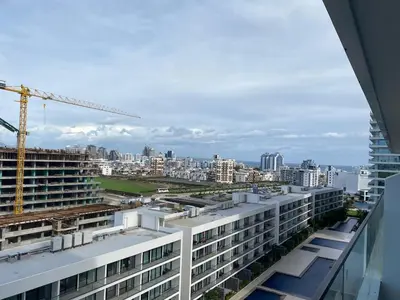 a view of a building under construction with a crane at Grand Sapphire Iskele Apartment С 161 in Larnaka
