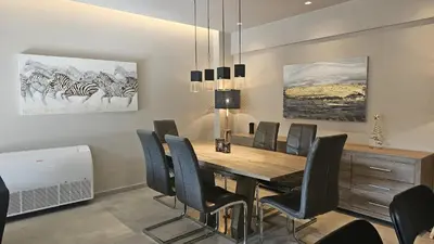 a dining room with a table and chairs at STAY Executive Retreat in Nicosia