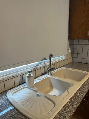 a kitchen sink with a faucet on top of it at CityLink-3Bedrooms Appartment CityCenter in Limassol