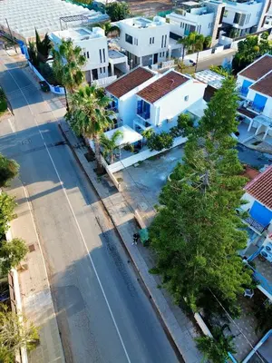 an overhead view of a street in a city at Modern 2BR Villa with Heated Hot Tub and Steps to Beach in Paralimni