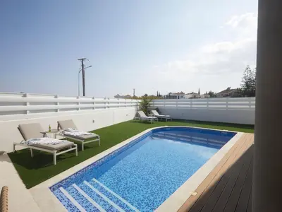a swimming pool on the roof of a house at Holiday Home Protaras Almaria Villa ALM08 by Interhome in Protaras