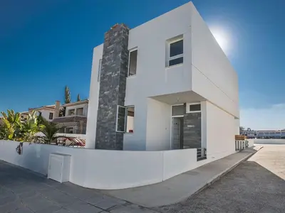a white house with a white wall at Holiday Home Protaras Perle Villa PE15 by Interhome in Protaras