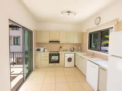 a kitchen with a washer and dryer at Holiday Home Ferienvilla für 10 Personen in Protaras by Interhome in Protaras