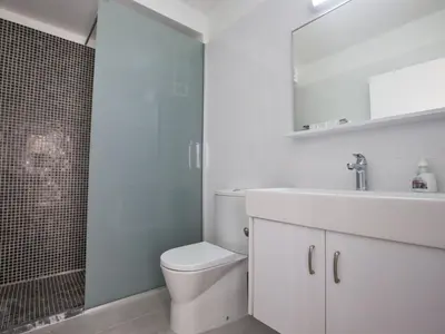 a bathroom with a toilet and a sink and a shower at Holiday Home Wunderschöne- geräumige Ferienvilla mit BBQ by Interhome in Protaras