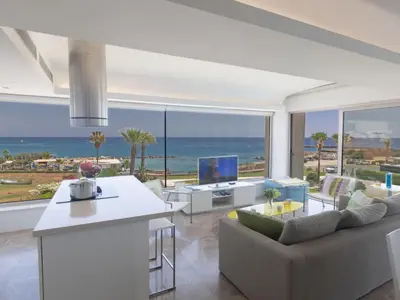 a living room with a view of the ocean at Apartment Luxuriöse Wohnung am Strand von Thalassa by Interhome in Protaras