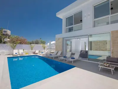 a swimming pool in the backyard of a house at Holiday Home Protaras Vie Bleu Villa VB5 by Interhome in Protaras