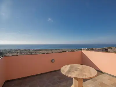 a room with a table and a view of the ocean at Holiday Home Private Villa mit Panoramablick auf das Meer by Interhome in Protaras