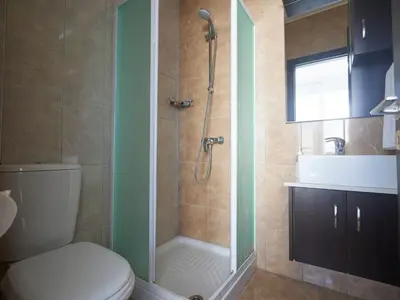 a bathroom with a shower and a toilet and a sink at Holiday Home in Paralimni mit geräumigem Garten by Interhome in Paralimni