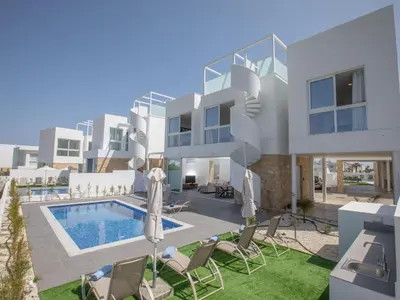 an image of a villa with a swimming pool at Holiday Home Ferienvilla Vie Bleu mit großem Pool by Interhome in Protaras