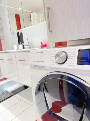 a washing machine in a kitchen with a sink at Lights of Paradise - Your Happy Escape in Ayia Napa