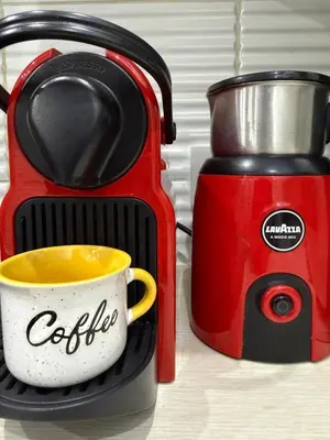 a coffee maker and a coffee cup on a counter at Lights of Paradise - Your Happy Escape in Ayia Napa