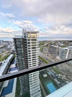 a view from the balcony of a building at Super Luxury 1 bedroom apartment on 27th floor in Grand Sapphire in Phrenaros