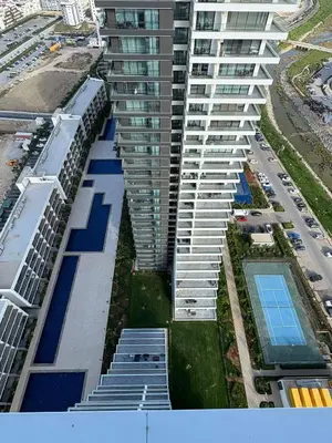 an aerial view of a tall building at Super Luxury 1 bedroom apartment on 27th floor in Grand Sapphire in Phrenaros