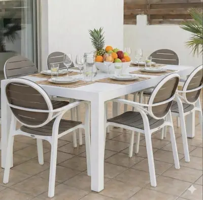 a white dining room table with four chairs at Fig Tree Beach villa Three in Protaras