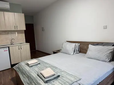 a bedroom with a bed with two towels on it at Room in EkinAdademir Dorm North Cyprus in Nicosia