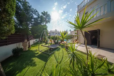 a playground in the yard of a house at The Nissi Duo Collection in Ayia Napa