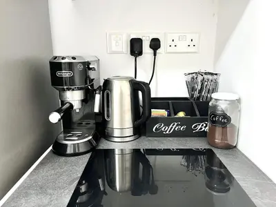 a coffee maker on a counter in a kitchen at STAY Blue House in Larnaka