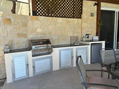 a kitchen with a stove and a counter top at Villa Acanthus in Pissouri