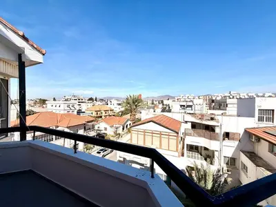 a balcony with a view of a city at The Perfect Lefkosa Stay - Zahra & Dereboyu & Ledra in Nicosia