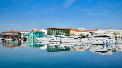 a group of boats are docked in a harbor at Spacious Dasoudi Beach Apt 3br in Limassol