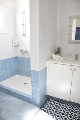 a bathroom with a shower and a sink at Sol y Mar Malama Villa in Paralimni