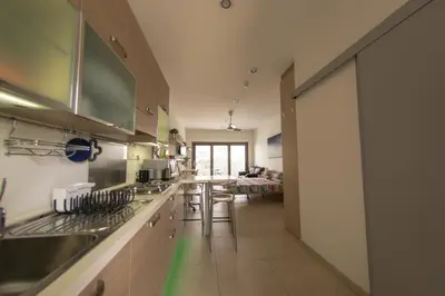 a kitchen with a sink and a counter top at Olivier Residence in Nicosia