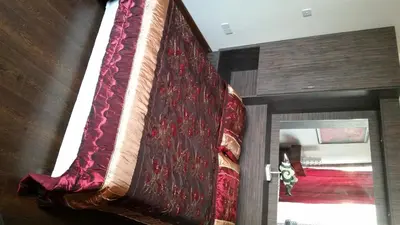 a large rug hanging on the wall of a room at Sylva Hotel in Limassol