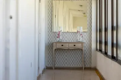 a bathroom with a sink and a mirror at Cactus in Larnaka