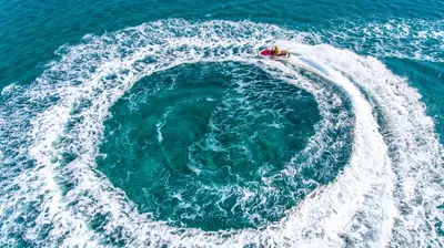 a small boat in the middle of the ocean at Lordos Beach Hotel & Spa in Larnaka