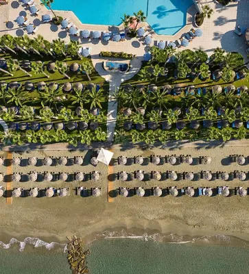 an overhead view of a resort with trees and water at The GrandResort - Leonardo Limited Edition in Limassol