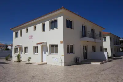 a large white building with a lot of windows at Sunny Cyprus in Paralimni