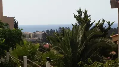 a view of the ocean from a house at Alkinoou Residence in Limassol