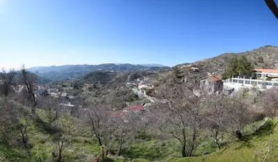 a view of a town on a mountain at Vasiliou House in Khandria