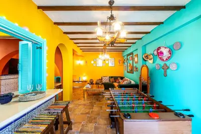 a room with a ping pong table in the middle at Castle Holiday Apartments in Limassol