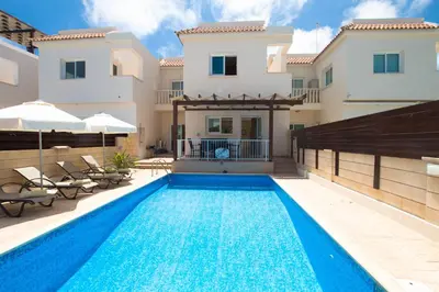a swimming pool in the backyard of a villa at myExclusiveVilla 683 in Protaras