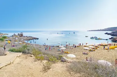 a group of people on a beach with the water at Villa Anette in Protaras