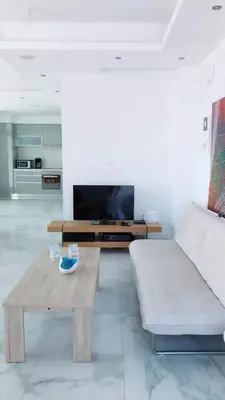 a living room with a couch and a coffee table at Villa Spathele in Paralimni