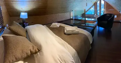a bedroom with a bed with two towels on it at Vasiliou House Krimenos in Khandria